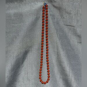Evoke Necklace Red Beads with Gold Tone Spacers 24 inches long